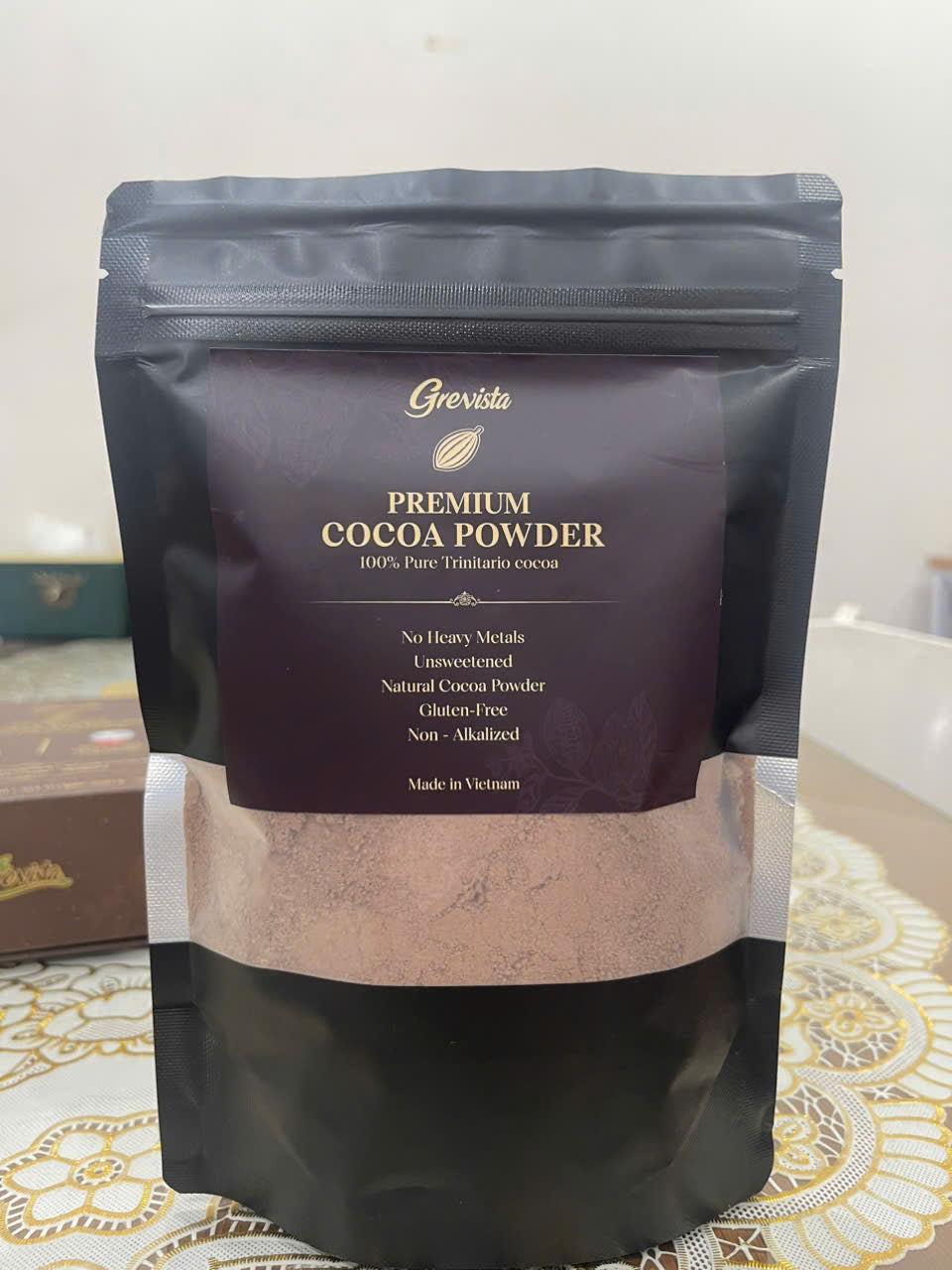 Close-up of non-alkalized natural cocoa powder showing its reddish-brown color